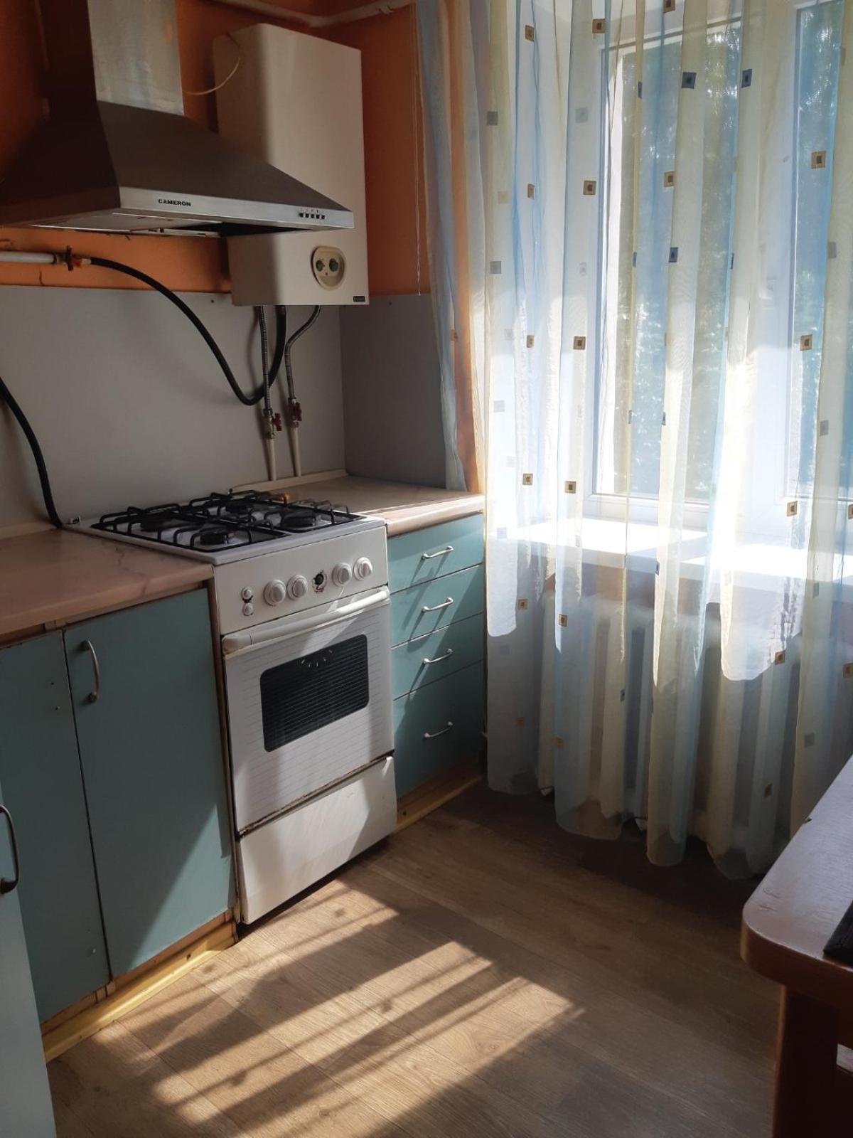 Воскресенская 12 Dnyipropetrovszk Szoba fotó